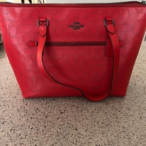 Brand new with tags Coach bag. Very good size
